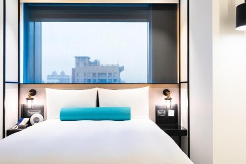 Imagen de la habitación del Hotel Caesar Metro Taipei. Foto 6