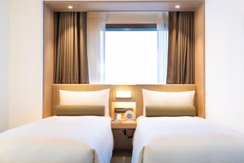 Imagen de la habitación del Hotel Caesar Metro Taipei. Foto 7