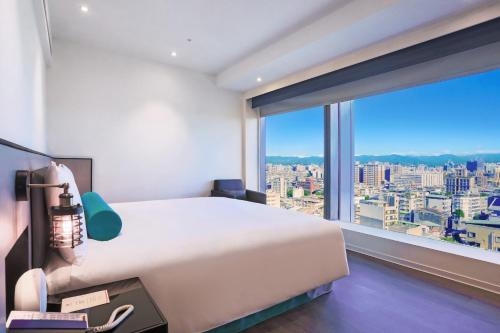 Imagen de la habitación del Hotel Caesar Metro Taipei. Foto 8