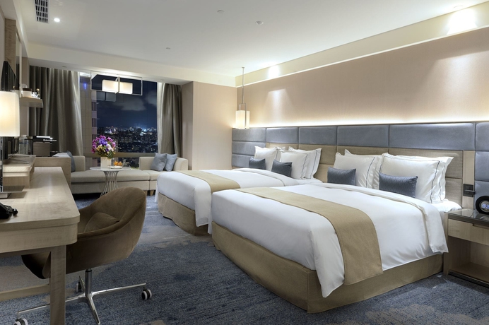 Imagen de la habitación del Hotel Caesar Park Banqiao. Foto 11