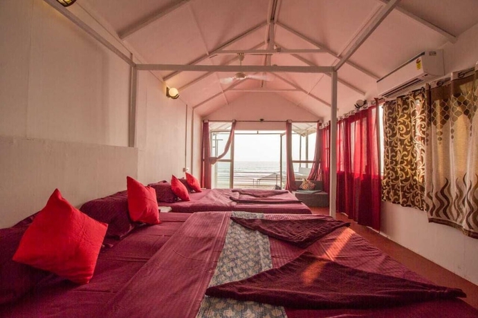 Imagen de la habitación del Hotel Cafe Del Mar Cottages And Rooms. Foto 2