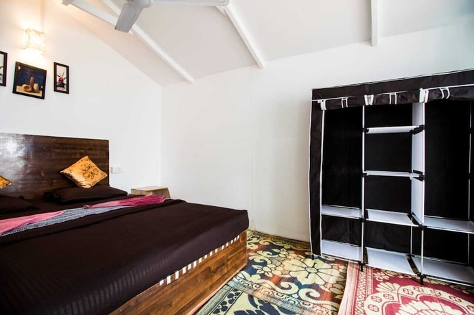 Imagen de la habitación del Hotel Cafe Del Mar Cottages And Rooms. Foto 9