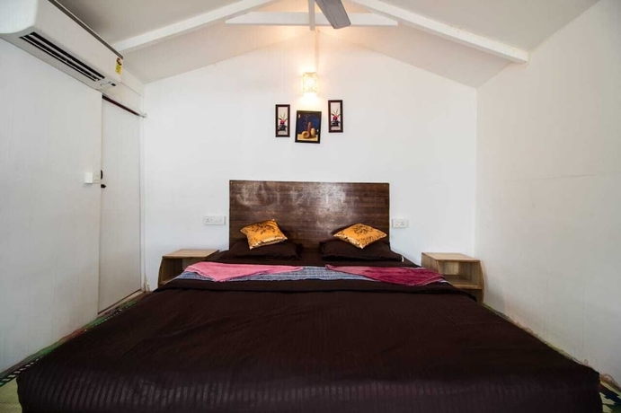 Imagen de la habitación del Hotel Cafe Del Mar Cottages And Rooms. Foto 11