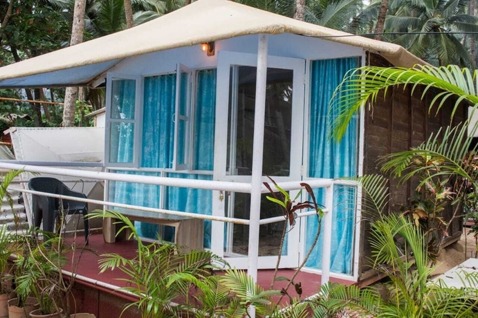 Imagen de la habitación del Hotel Cafe Del Mar Cottages And Rooms. Foto 13