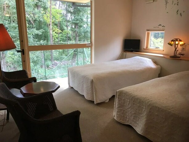 Imagen de la habitación del Hotel Cafe Restaurant B&B Burari. Foto 10