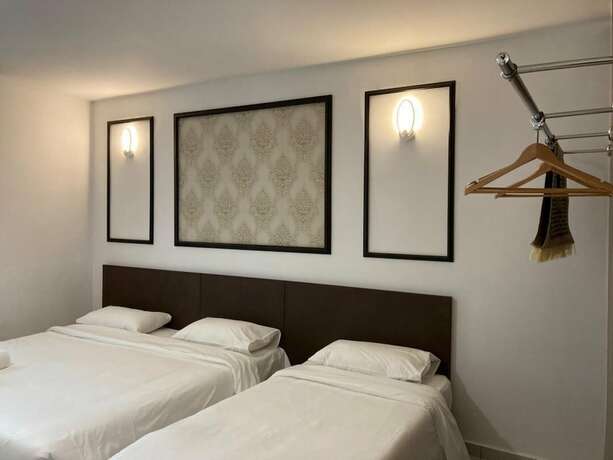 Imagen general del Hotel Cafe and Capital O 90756 Cara Hulu. Foto 1