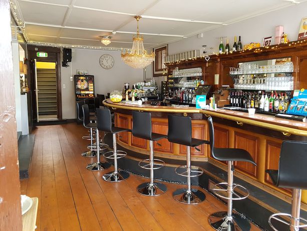 Imagen del bar/restaurante del Hotel Cafe pension The Chandelier. Foto 5