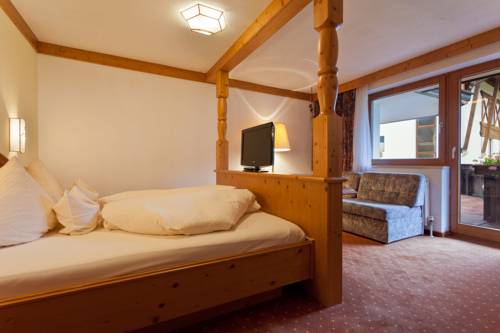 Imagen de la habitación del Hotel Caf&eacute; Aparthotel K&auml;serstube. Foto 10