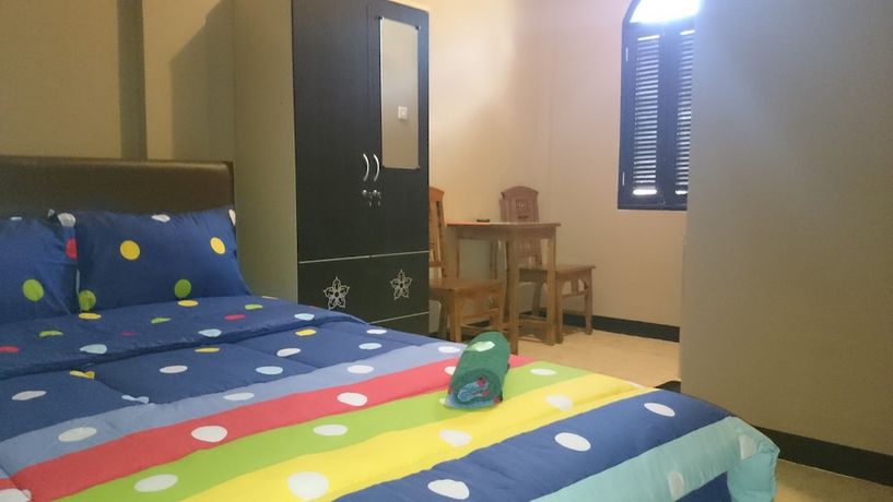 Imagen de la habitación del Hotel Caf&eacute; Johan Home Stay Senggigi. Foto 6