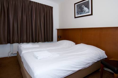 Imagen de la habitación del Hotel Café Restaurant Abina. Foto 10