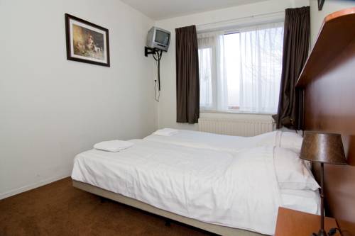 Imagen de la habitación del Hotel Café Restaurant Abina. Foto 11