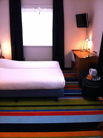 Imagen de la habitación del Hotel Caf&eacute; Restaurant Monopole. Foto 10