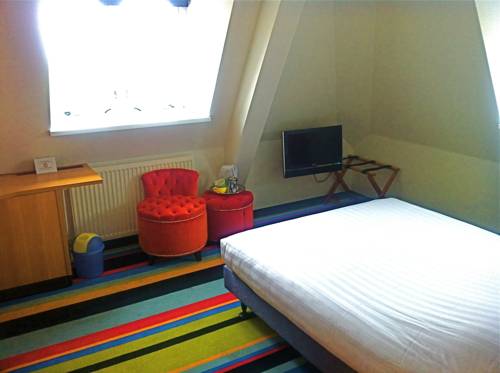 Imagen de la habitación del Hotel Caf&eacute; Restaurant Monopole. Foto 13