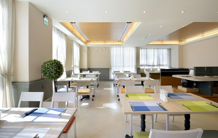 Imagen del bar/restaurante del Hotel Caffir Garden. Foto 16