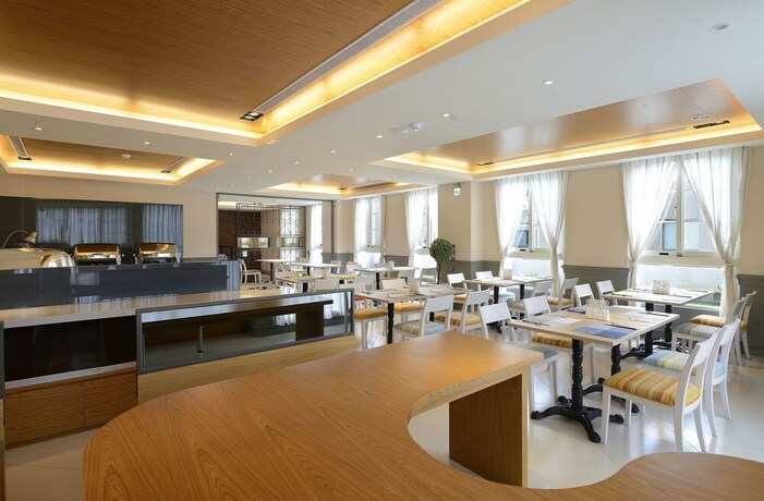 Imagen del bar/restaurante del Hotel Caffir Garden. Foto 19