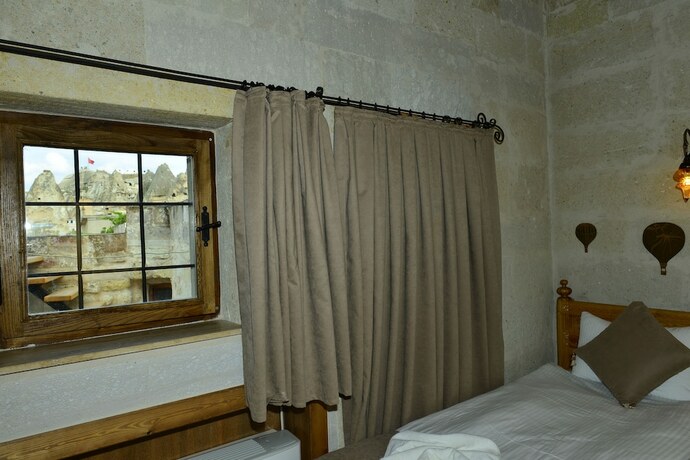 Imagen de la habitación del Hotel Caftan Cave Suites. Foto 19