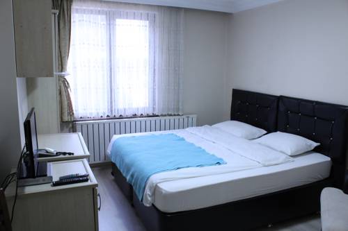 Imagen de la habitación del Hotel Cag. Foto 3