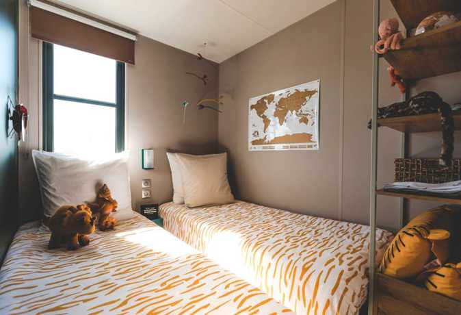 Imagen de la habitación del Hotel C&agrave;mping and Bungalows Platja Brava. Foto 8