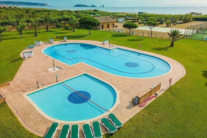 Imagen de la habitación del Hotel C&agrave;mping and Bungalows Platja Brava. Foto 9