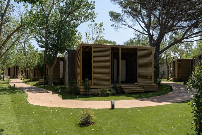 Imagen de la habitación del Hotel C&agrave;mping and Bungalows Platja Brava. Foto 10