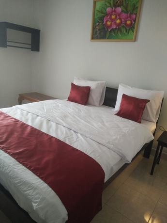 Imagen de la habitación del Hotel Cahaya Adrian. Foto 4