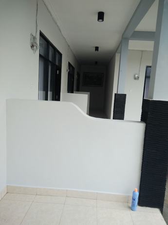 Imagen de la habitación del Hotel Cahaya Adrian. Foto 7