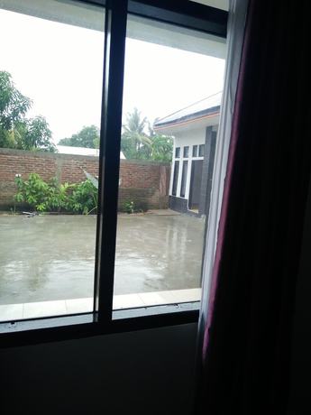 Imagen de la habitación del Hotel Cahaya Adrian. Foto 9