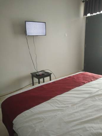 Imagen de la habitación del Hotel Cahaya Adrian. Foto 10