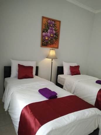 Imagen de la habitación del Hotel Cahaya Adrian. Foto 13