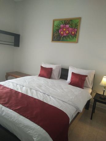 Imagen de la habitación del Hotel Cahaya Adrian. Foto 14