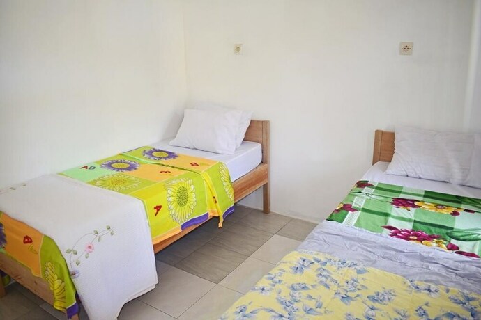 Imagen de la habitación del Hotel Cahaya Tetebatu Inn. Foto 25