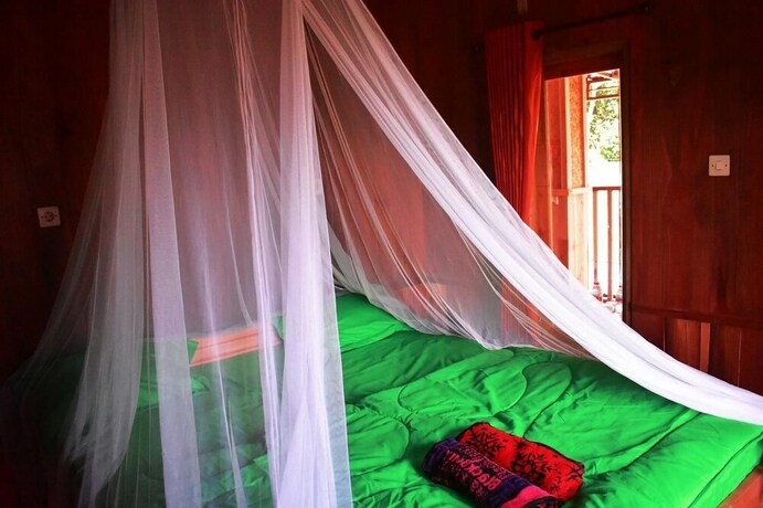 Imagen de la habitación del Hotel Cahaya Tetebatu Inn. Foto 31