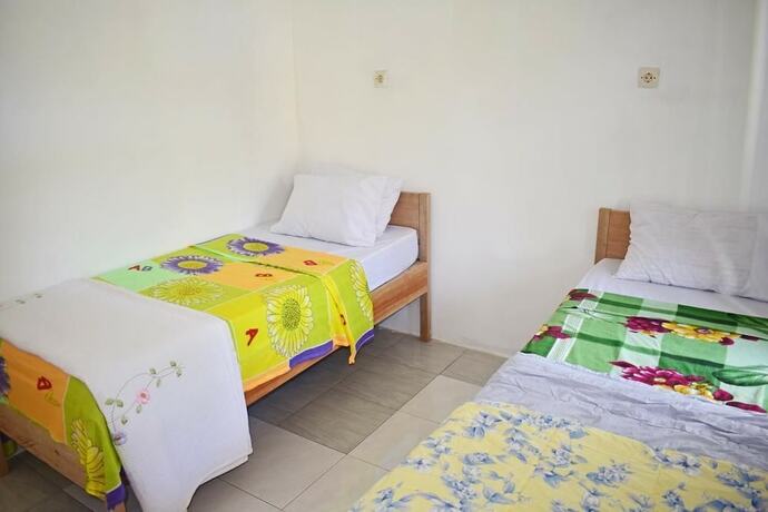 Imagen de la habitación del Hotel Cahaya Tetebatu Inn. Foto 32