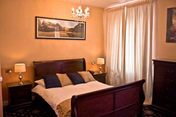 Imagen de la habitación del Hotel Cahir House. Foto 2