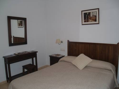 Imagen de la habitación del Hotel Caico's. Foto 7