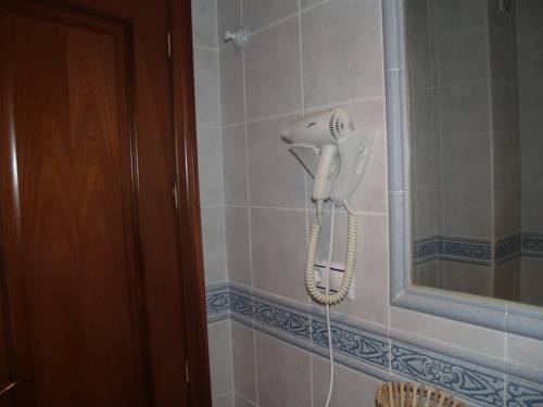 Imagen de la habitación del Hotel Caico's. Foto 12