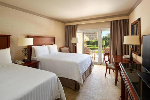 Imagen de la habitación del Hotel Cairo Marriott. Foto 19