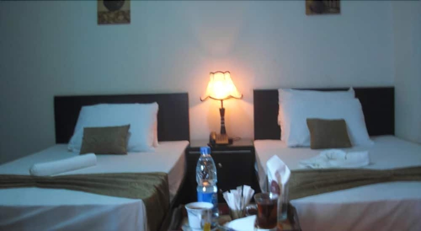 Imagen de la habitación del Hotel Cairo Plaza Guest House. Foto 11