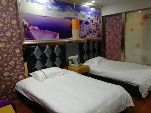 Imagen de la habitación del Hotel Caiyuan. Foto 4