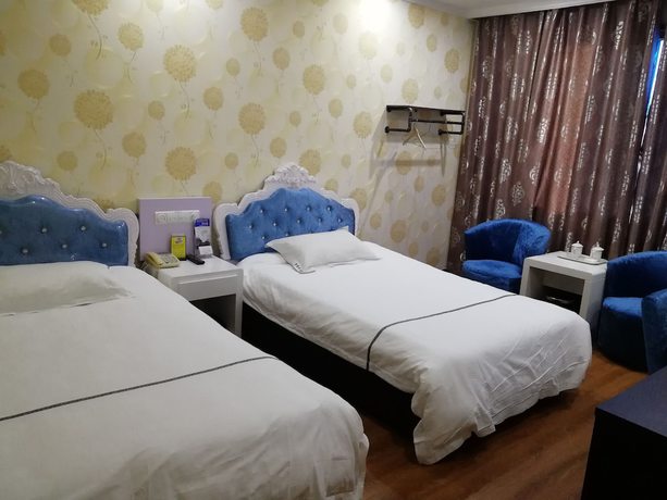 Imagen de la habitación del Hotel Caiyuan. Foto 5