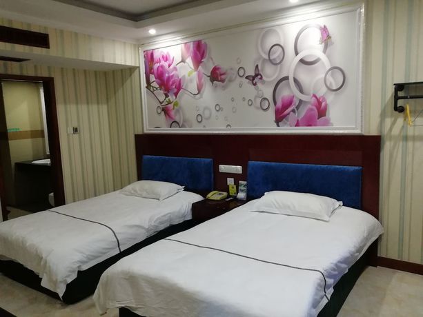 Imagen de la habitación del Hotel Caiyuan. Foto 6