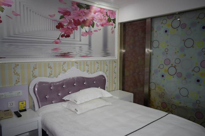 Imagen de la habitación del Hotel Caiyuan. Foto 7