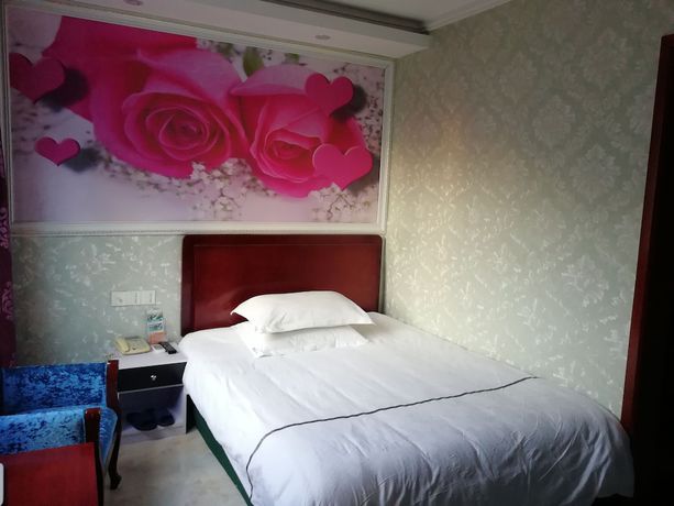 Imagen de la habitación del Hotel Caiyuan. Foto 8