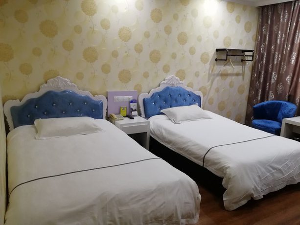 Imagen de la habitación del Hotel Caiyuan. Foto 9