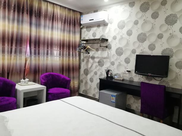 Imagen de la habitación del Hotel Caiyuan. Foto 10