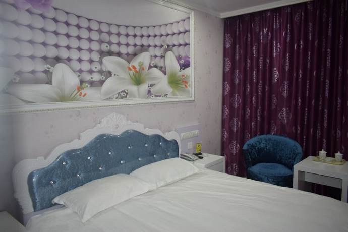 Imagen de la habitación del Hotel Caiyuan. Foto 11