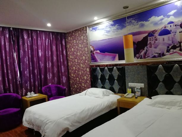 Imagen de la habitación del Hotel Caiyuan. Foto 12