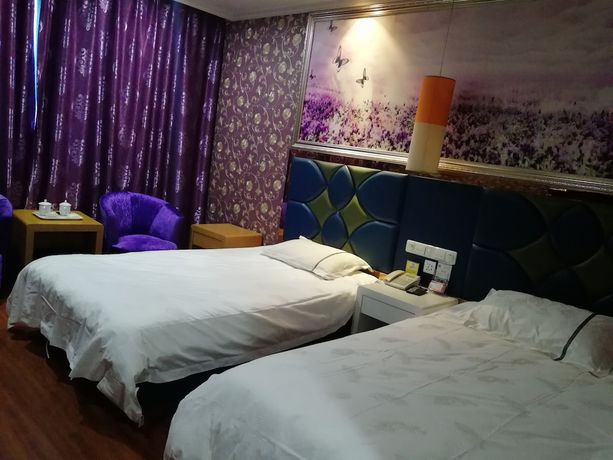 Imagen de la habitación del Hotel Caiyuan. Foto 14