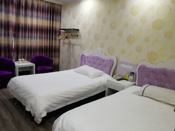 Imagen de la habitación del Hotel Caiyuan. Foto 15