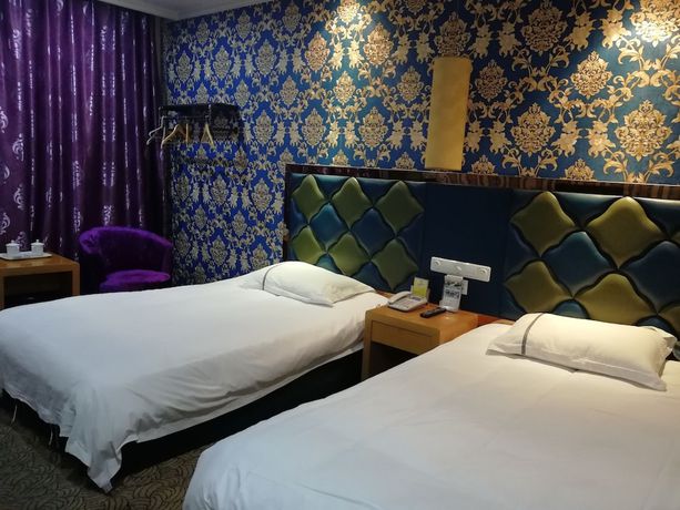 Imagen de la habitación del Hotel Caiyuan. Foto 17